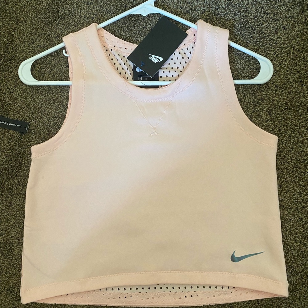 Nike crop tank top. Brand new with tags, size medium.